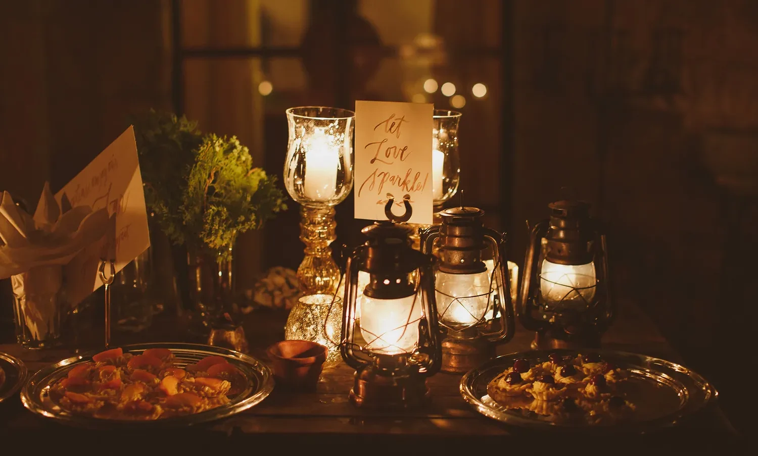 Romantic Castello Di Vicarello wedding reception details: lanterns, candles, and