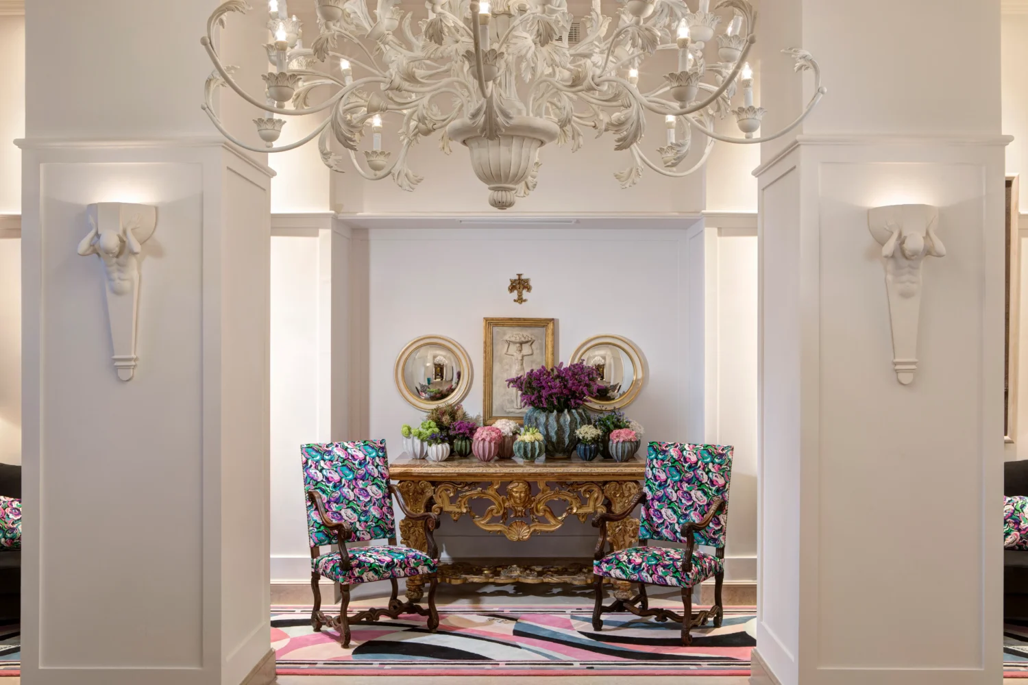 Elegant lobby at Hotel Savoy, a Rocco Forte Hotel in Florence, Italy. Features ornate furniture and floral arrangements.