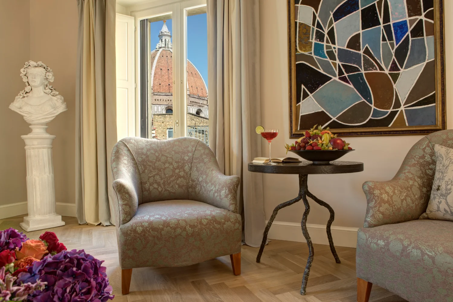 Luxurious Florence hotel room with Duomo view, perfect for a romantic honeymoon in Italy.