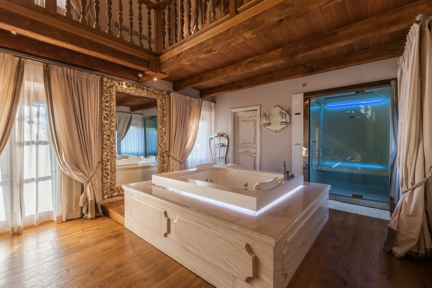 Luxurious bathroom with jacuzzi tub and glass shower, perfect for a romantic Italian countryside wedding at Relais La Corte Dei Papi.