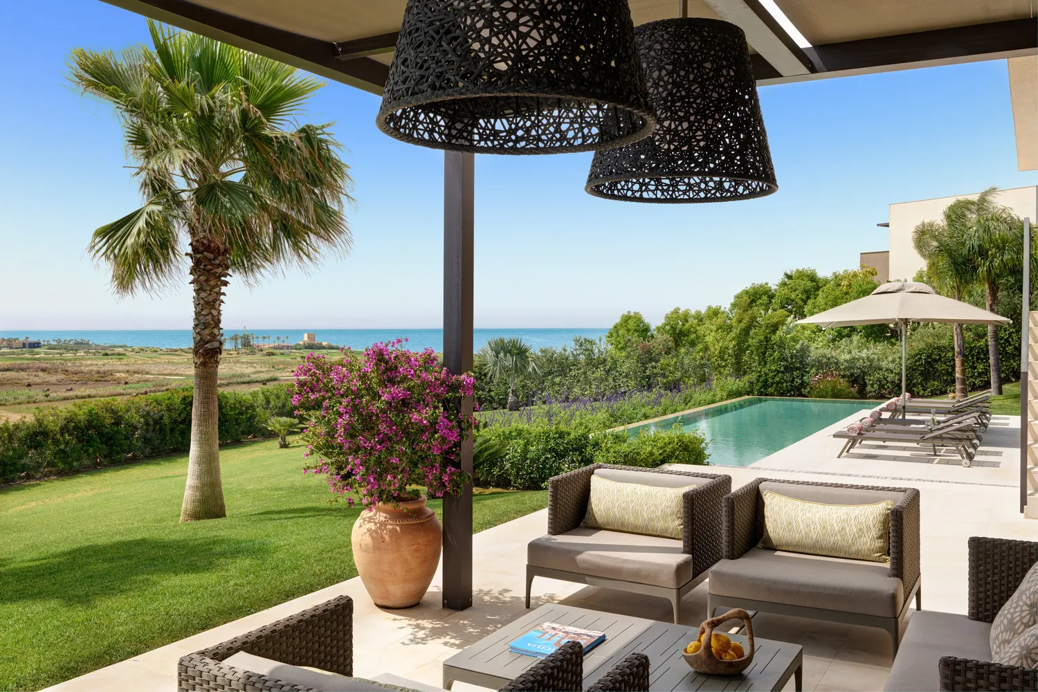 Luxury patio overlooking the sea at Verdura Resort in Sicily, perfect for a destination wedding.