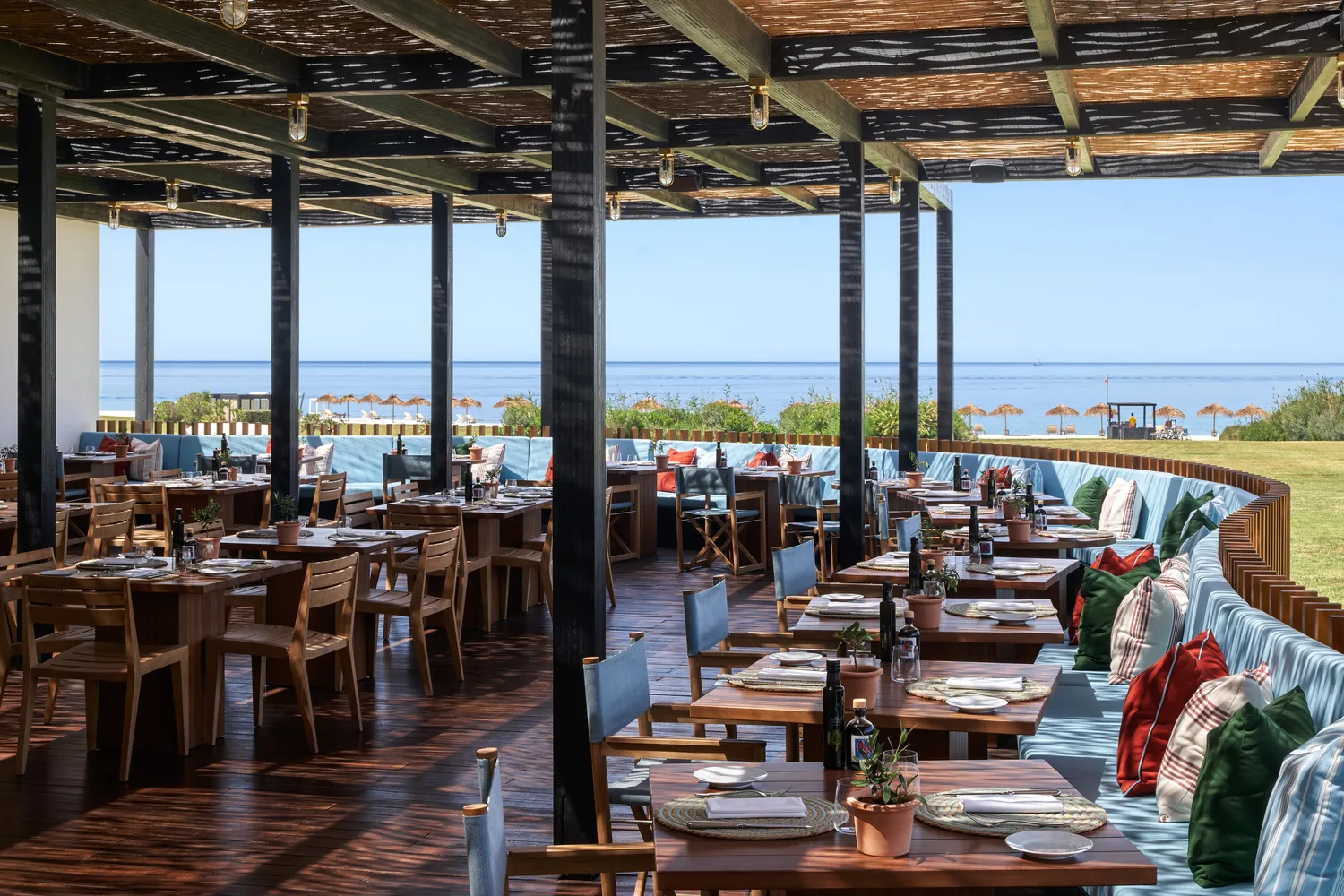 Outdoor restaurant at Verdura Resort in Sicily, overlooking the ocean. Perfect for a destination wedding.