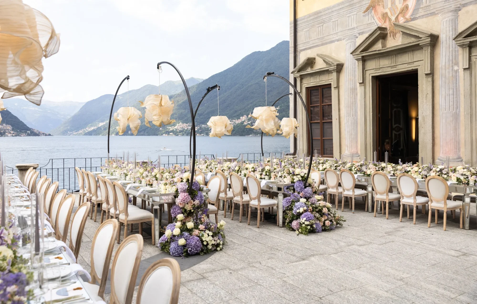 Elegant wedding reception at Villa Pliniana, a private Italian wedding villa overlooking a lake.