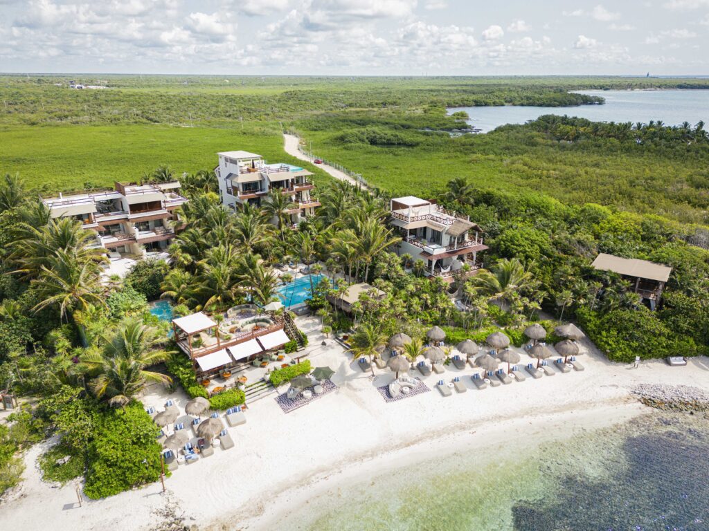 Jashita Hotel Tulum aerial view, a stunning Tulum wedding venue on a white sand beach with turquoise water.