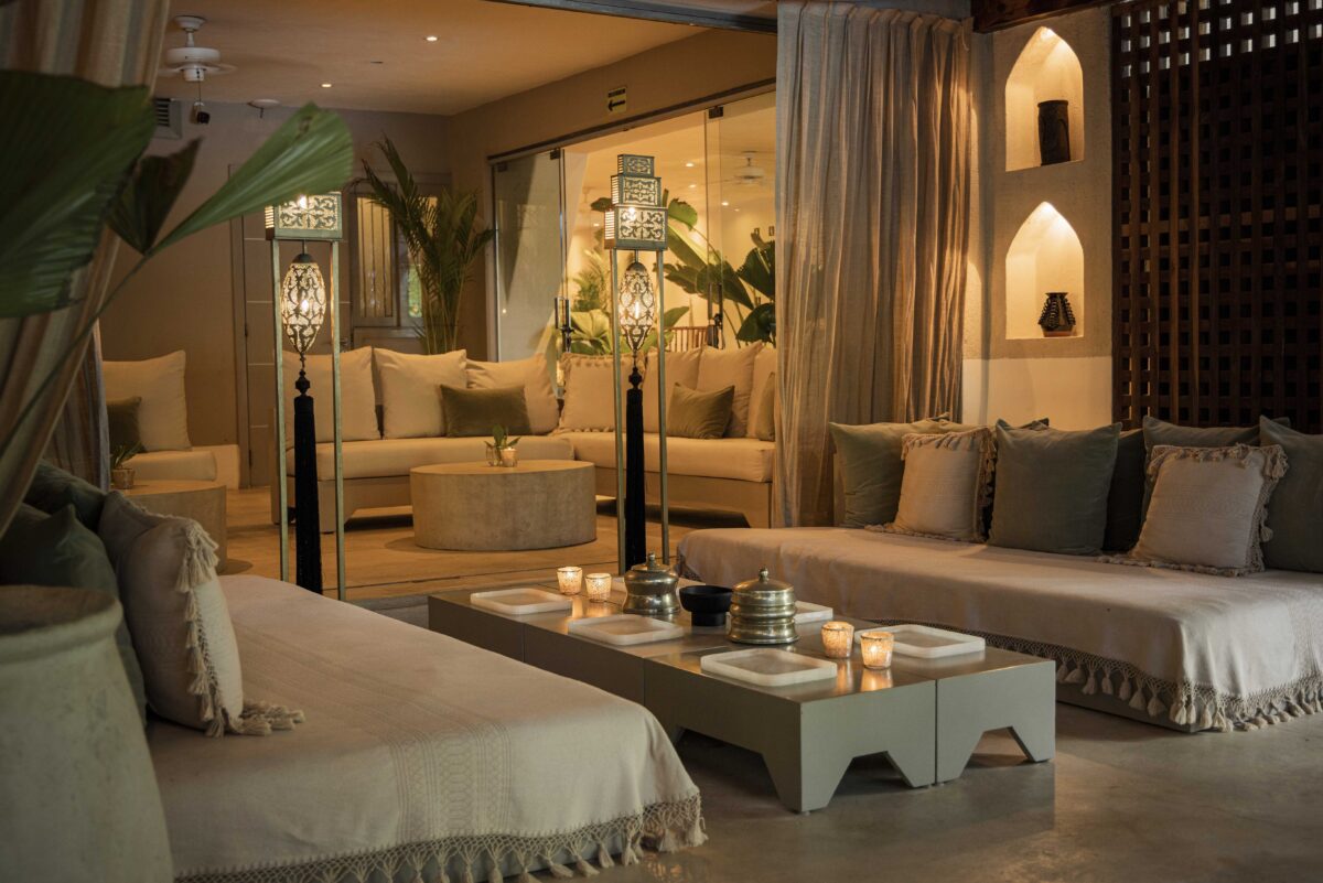 Jashita Hotel Tulum: Luxurious lounge area with daybeds and Moroccan-inspired decor.