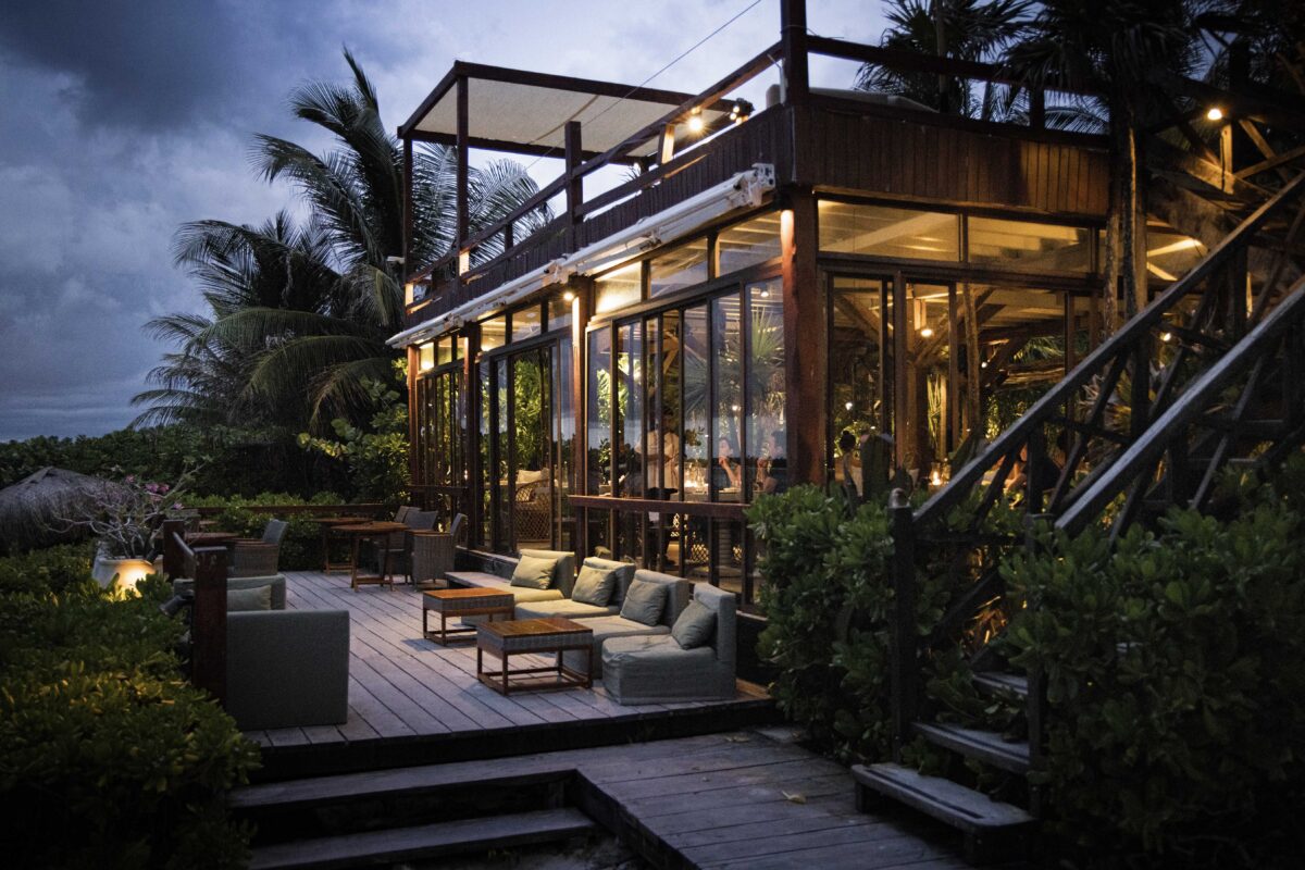 Jashita Hotel Tulum wedding venue with outdoor seating at dusk.