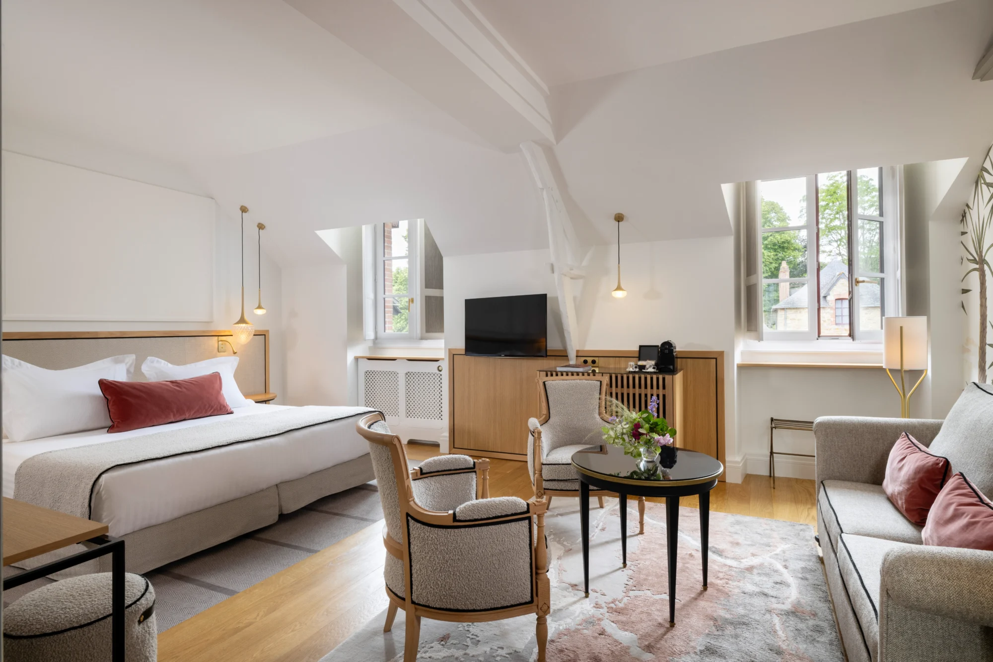 Luxurious bedroom suite at Domaine de la Bretesche, ideal for a French castle wedding.