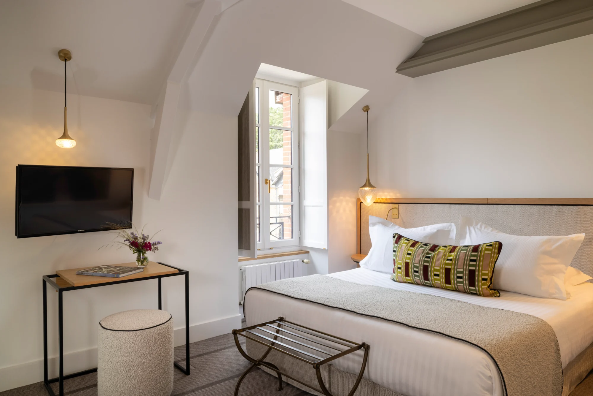 Elegant bedroom in a French castle, perfect for a Domaine de la Bretesche wedding.