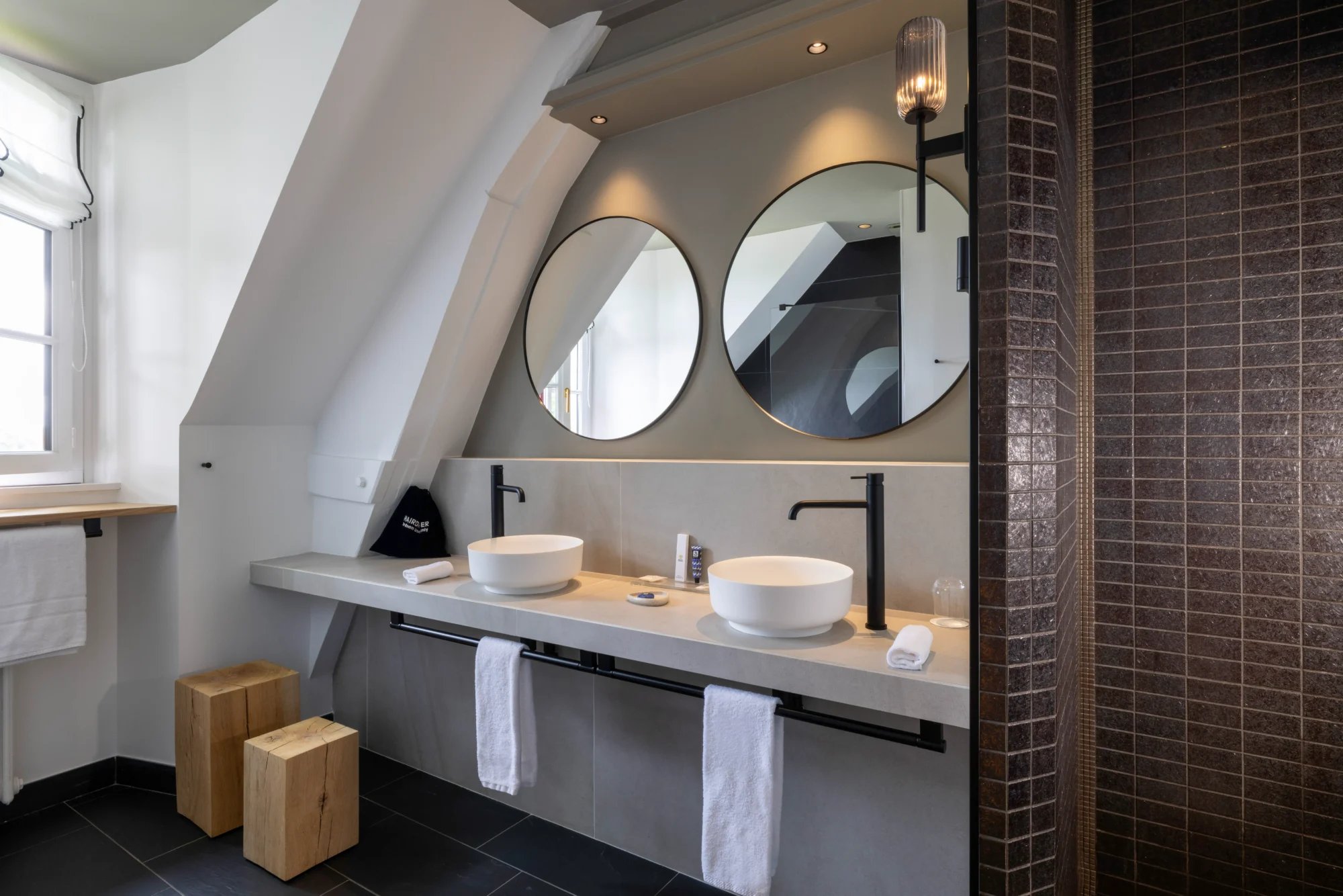 Luxurious bathroom with double sinks in a French castle. Perfect for a Domaine de la Bretesche wedding.
