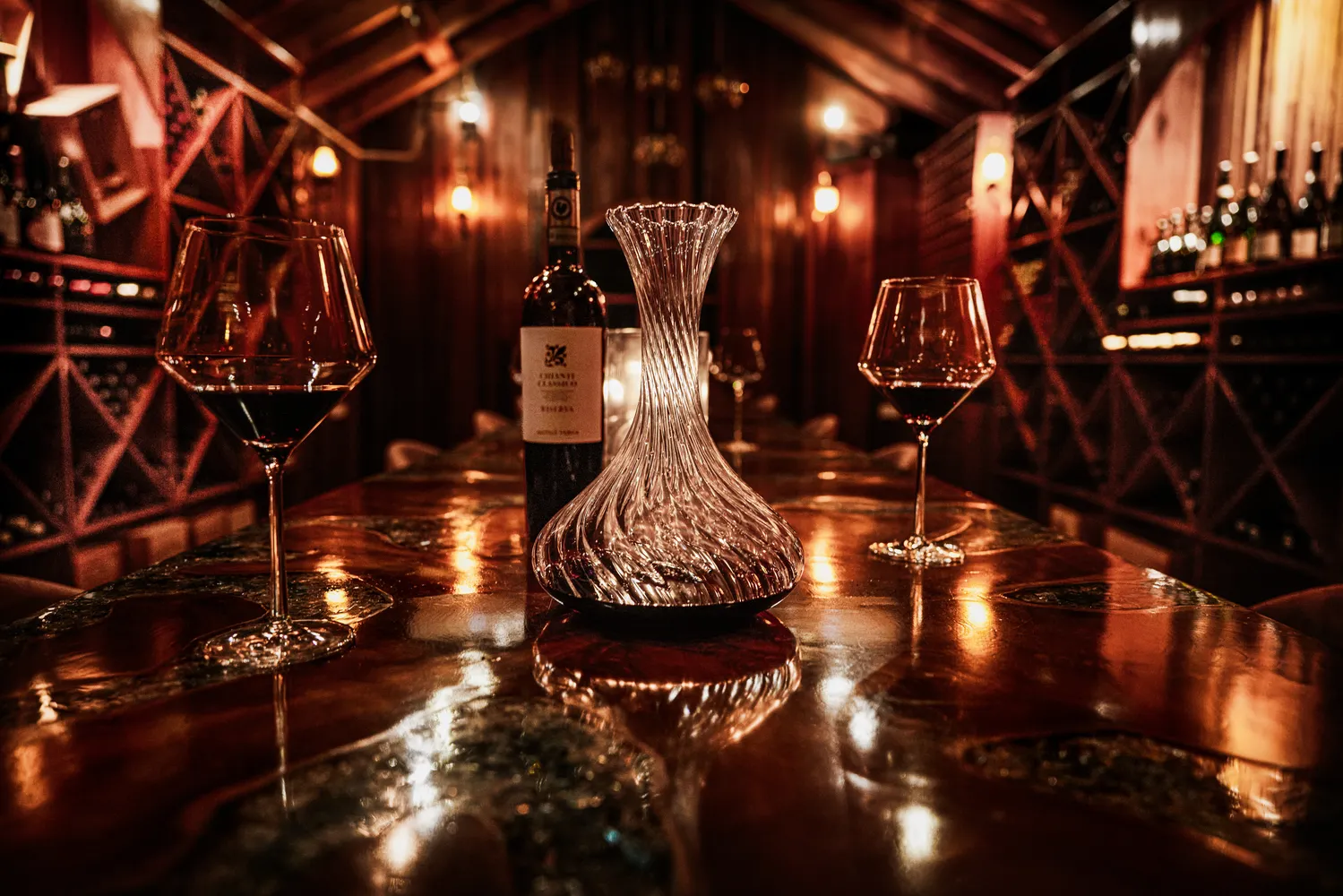 Romantic wine tasting in a dimly lit wine cellar. Perfect for an Island Wedding & Honeymoon at Ladera Resort.