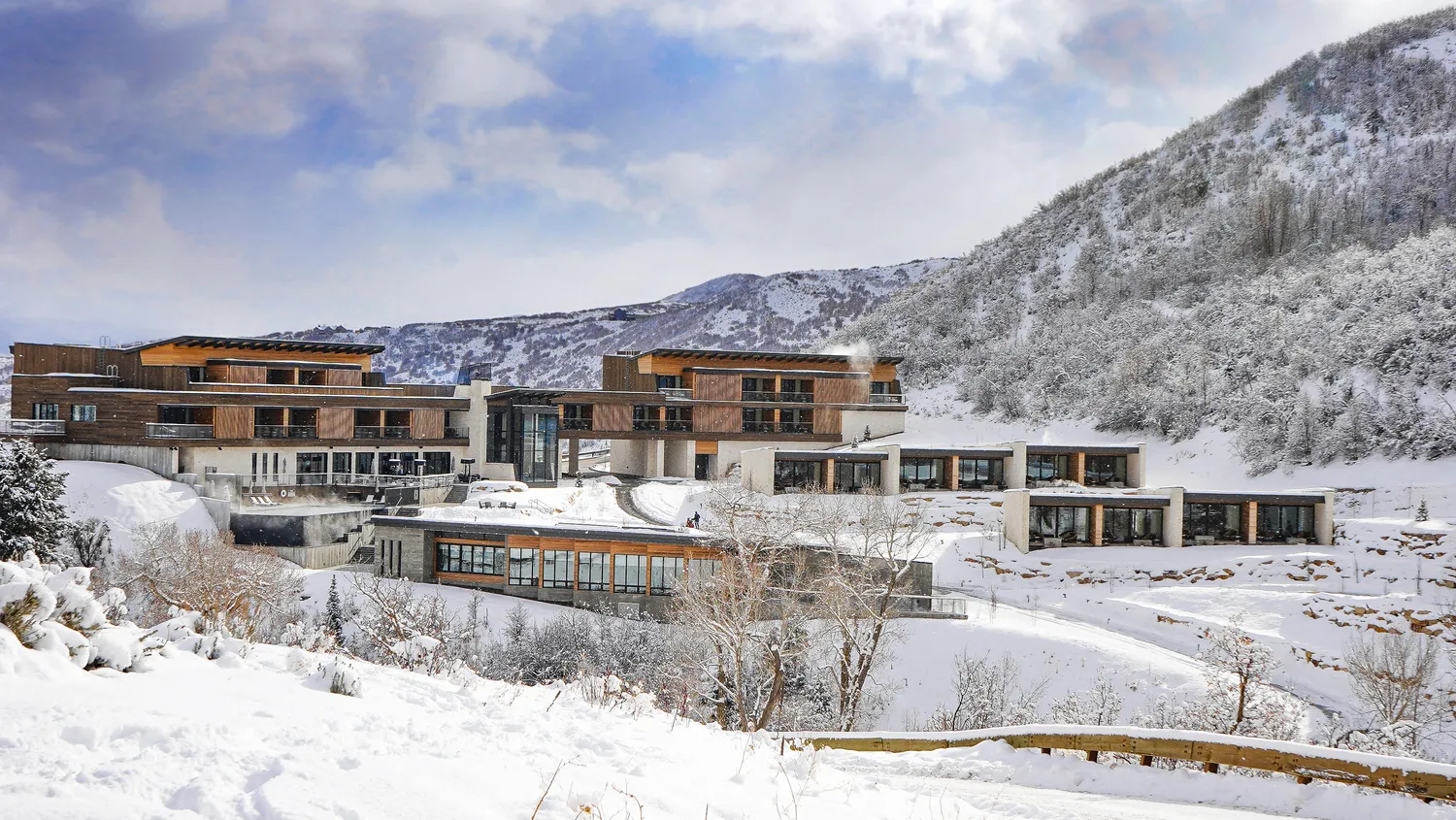 The Lodge at Blue Sky, Auberge Resorts Collection nestled in a snowy Utah mountainside. Perfect Utah ranch wedding venue.