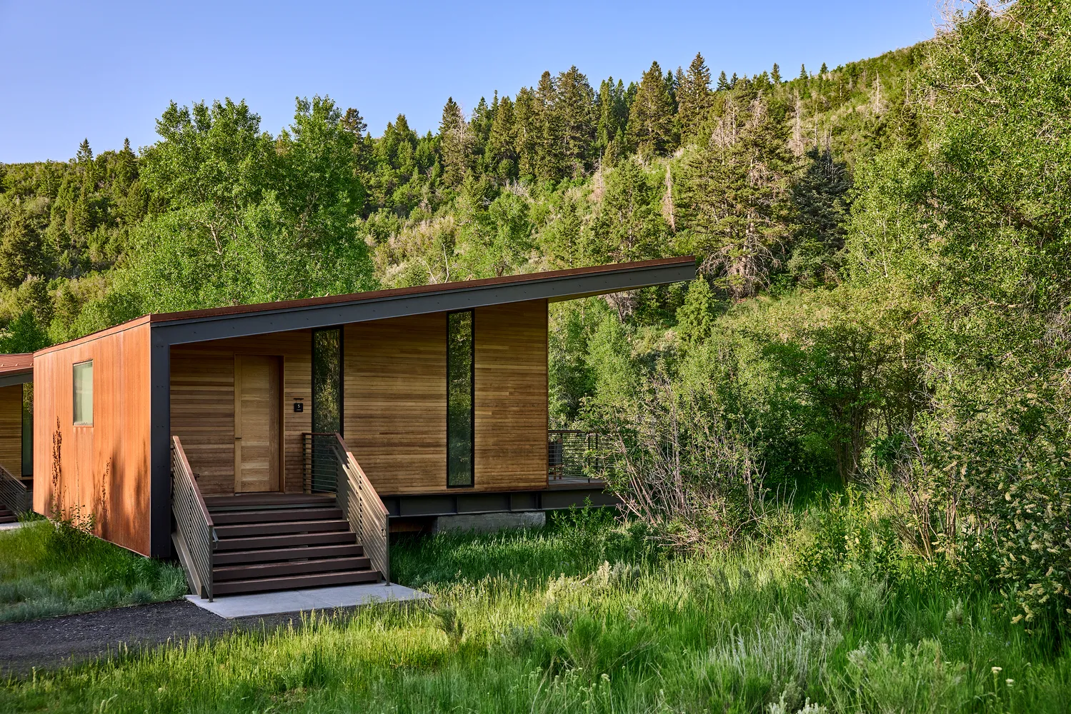 Modern lodge nestled in a lush Utah landscape. Ideal for a Utah ranch wedding.
