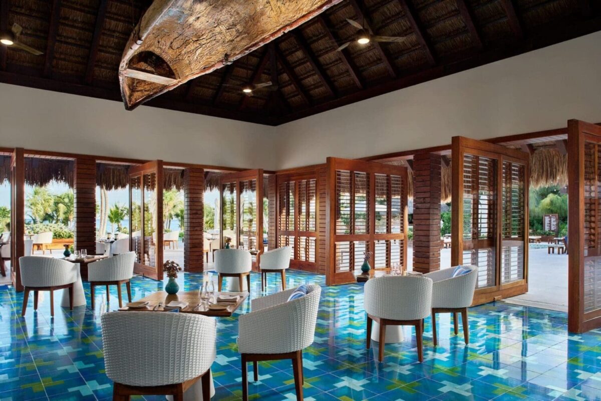 Elegant dining area at Chablé Maroma, a luxury wedding & honeymoon resort. Ocean views.