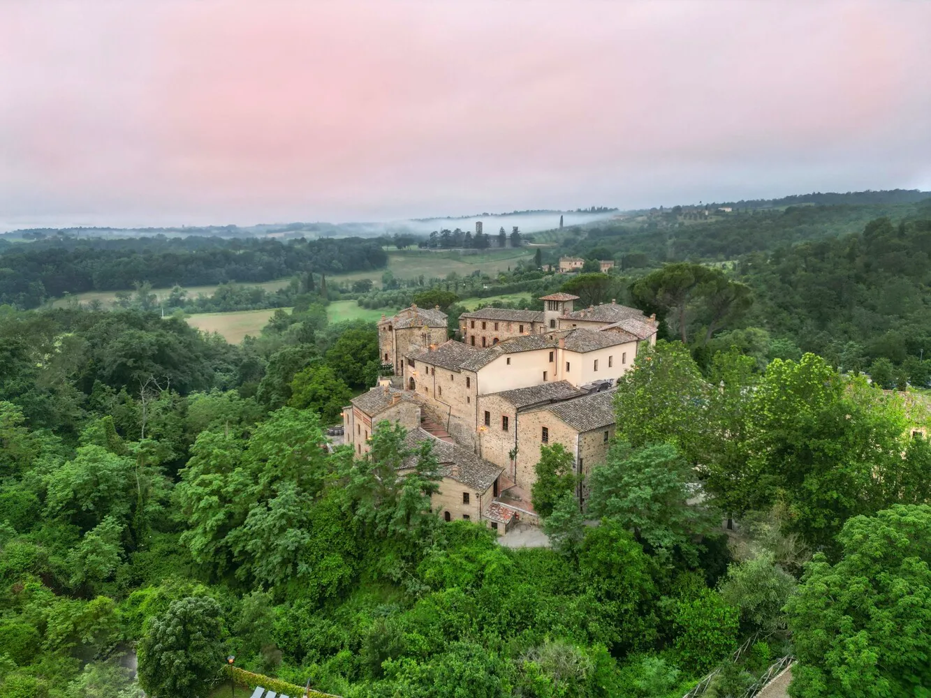 Aerial view of Castel Monastero in Tuscany, Italy. Perfect for Tuscany weddings & honeymoons.