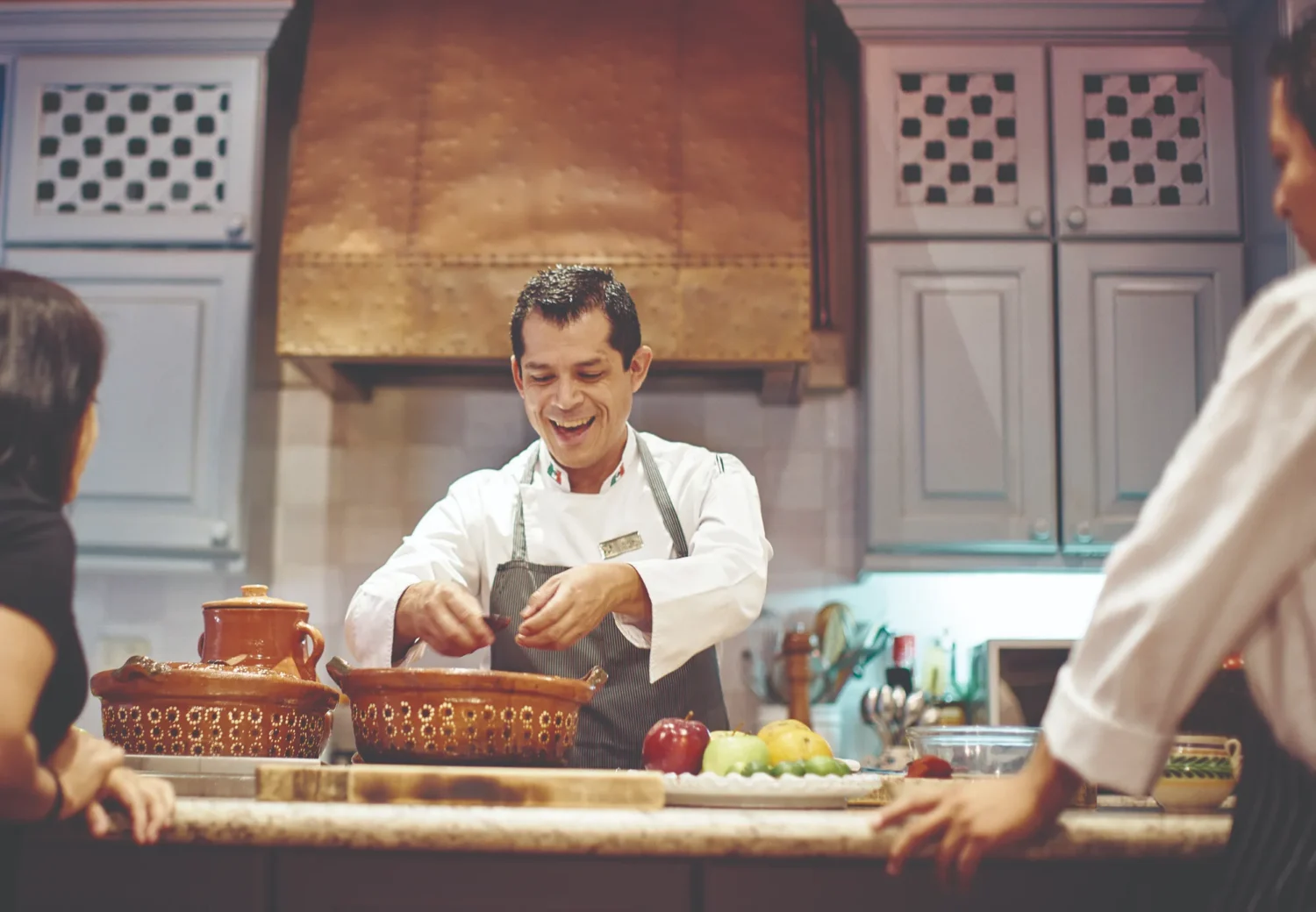 Chef instructing cooking class at Casa de Sierra Nevada, a Belmond Hotel.