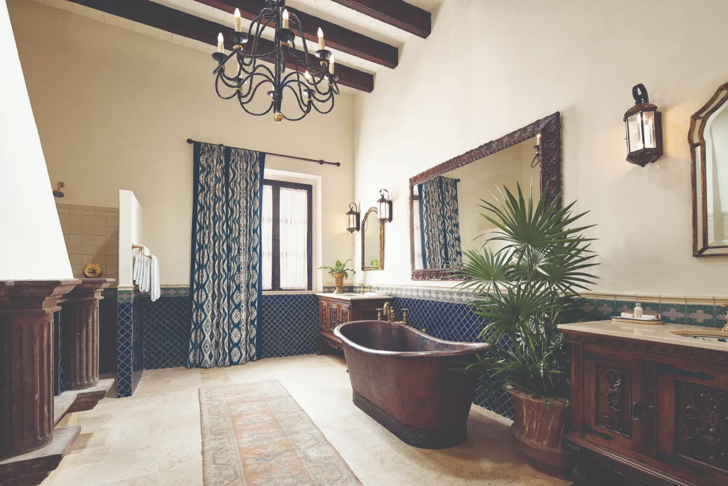 Luxurious bathroom at Casa de Sierra Nevada, featuring a copper tub and ornate details.