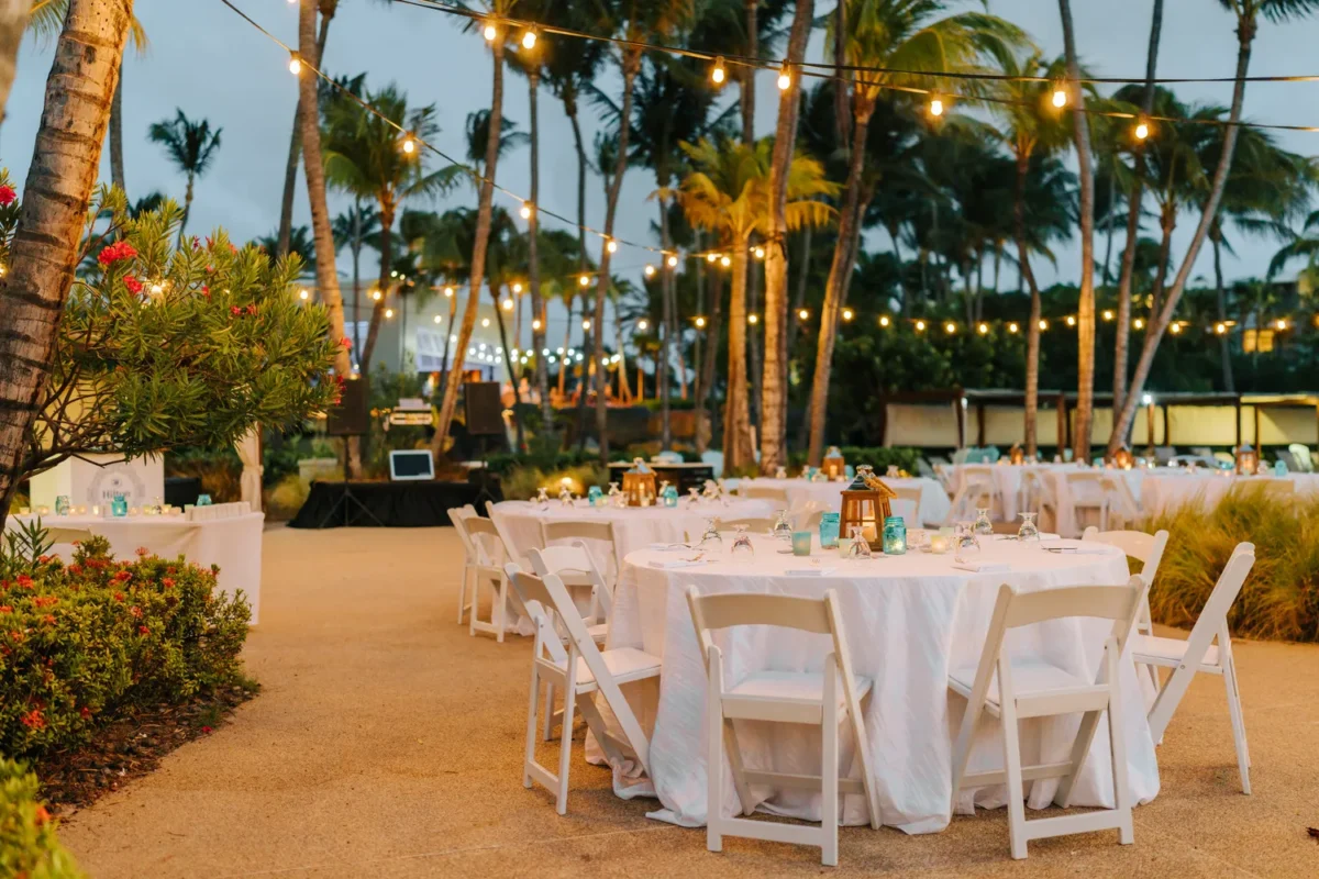 Outdoor reception at Hilton Aruba for a destination wedding with string lights.