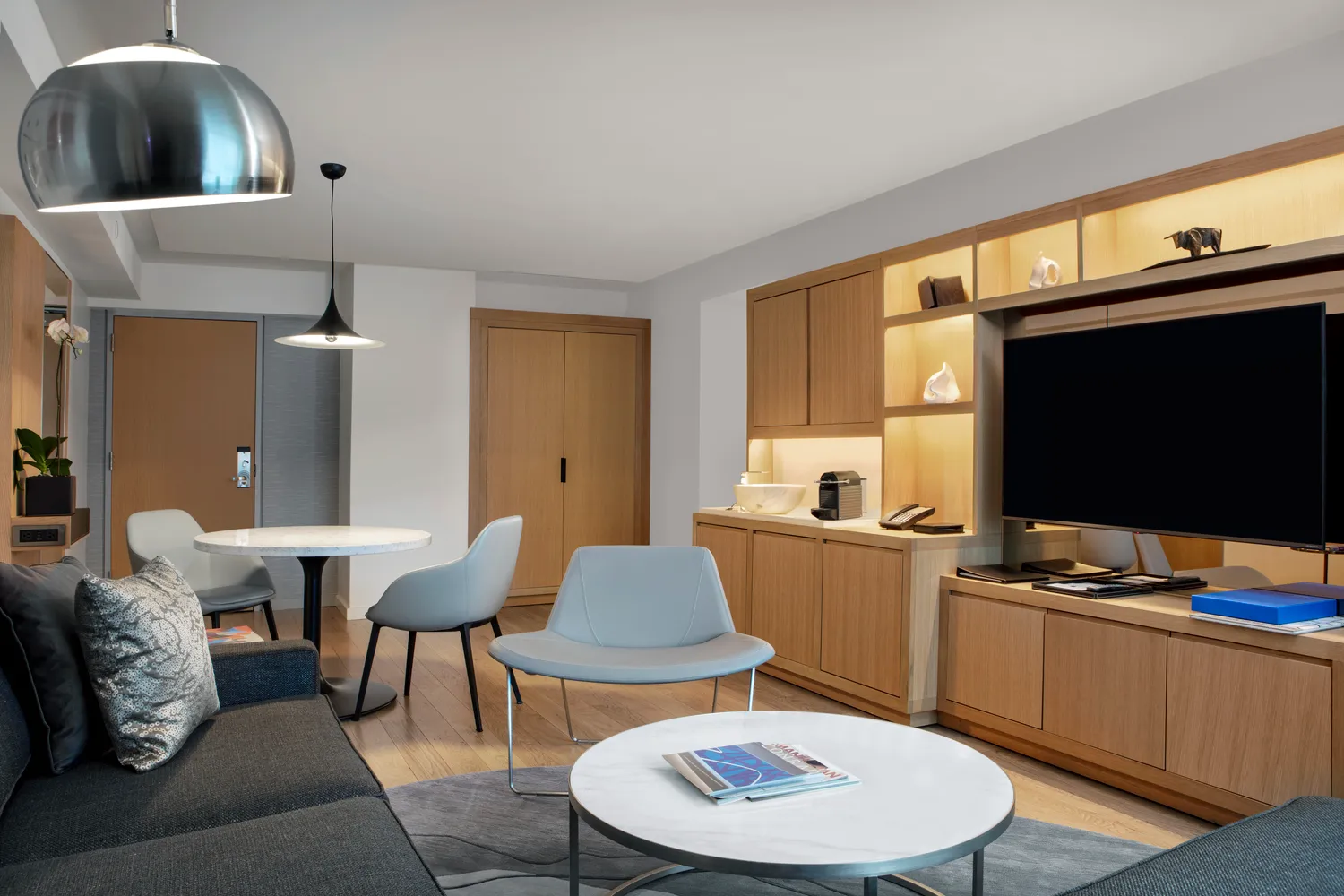 Modern suite at Conrad New York Downtown, ideal for NYC wedding guests.