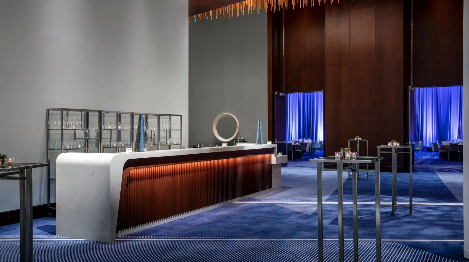 Modern bar and reception area at the Conrad New York Downtown, ideal for NYC weddings.