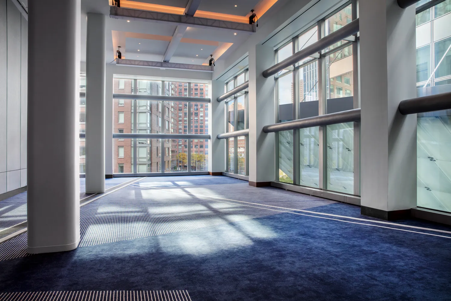 Modern NYC wedding venue at Conrad New York Downtown. Spacious interior with large windows.