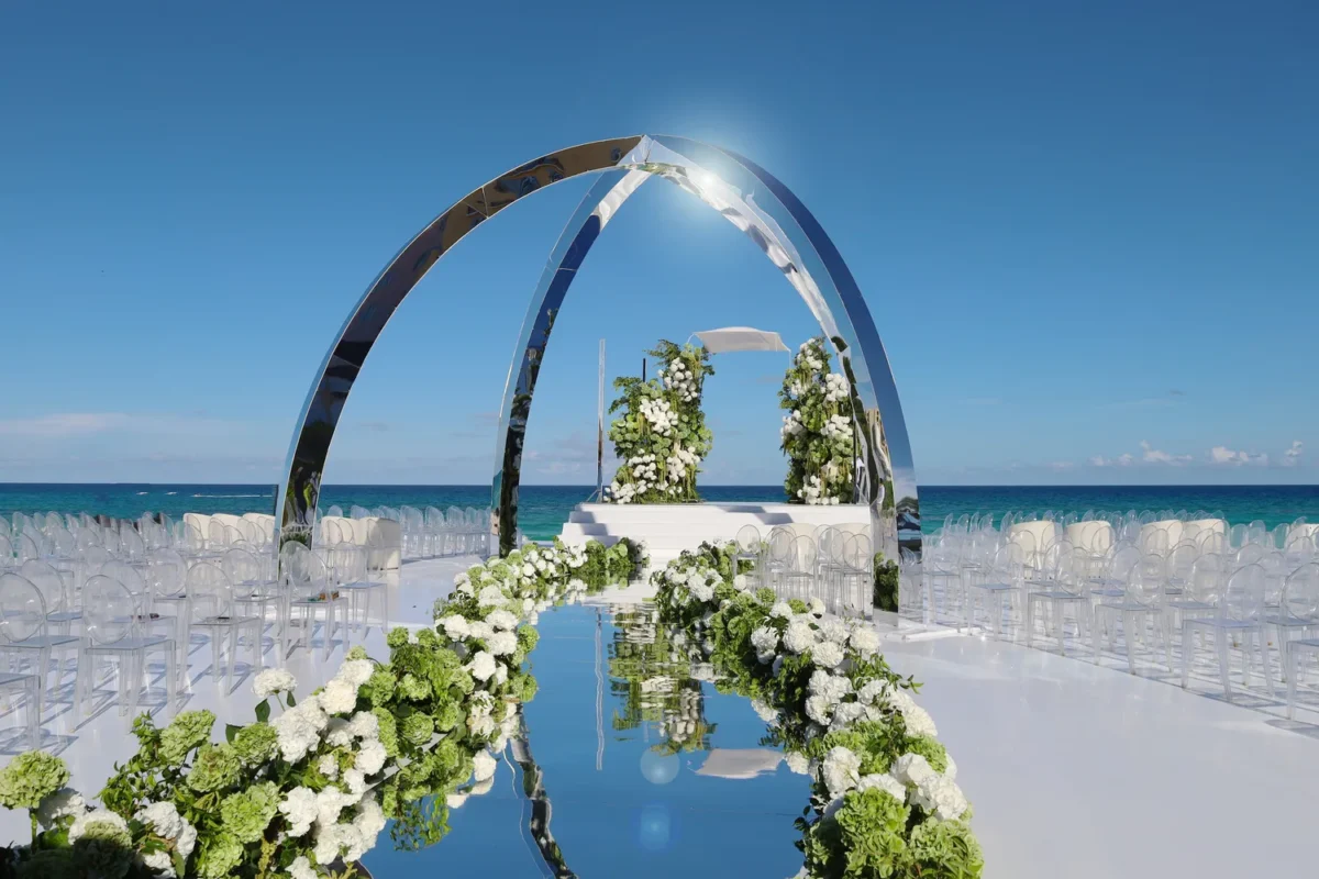 Beachfront destination wedding ceremony at Kempinski Hotel Cancún