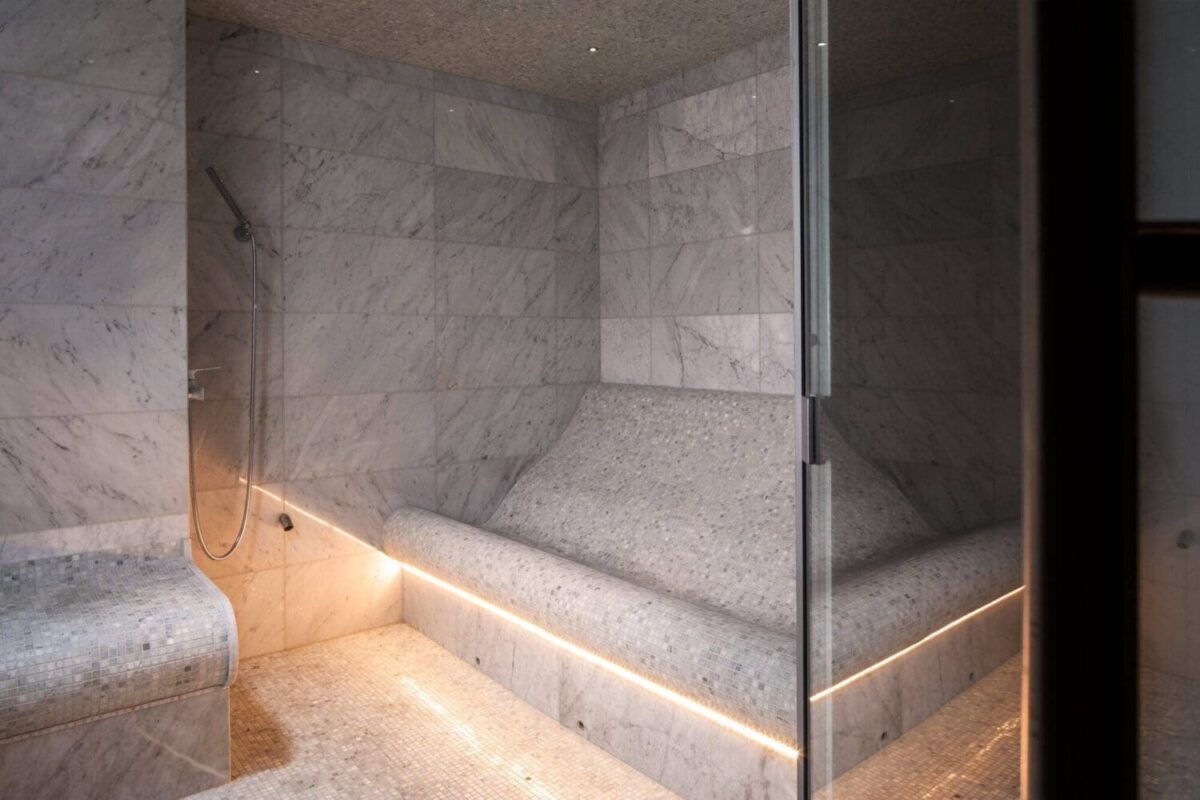 Luxurious marble steam room at the Paris j'Adore Hotel & Spa, perfect for a romantic honeymoon.