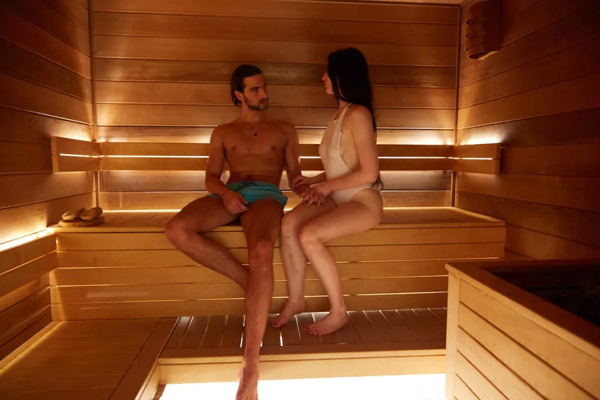 Couple relaxing in a luxurious Paris hotel spa. Perfect for a romantic honeymoon getaway.