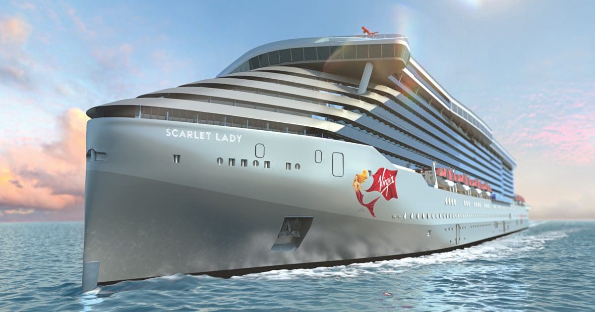 Luxurious cruise ship Scarlet Lady sailing at sunset