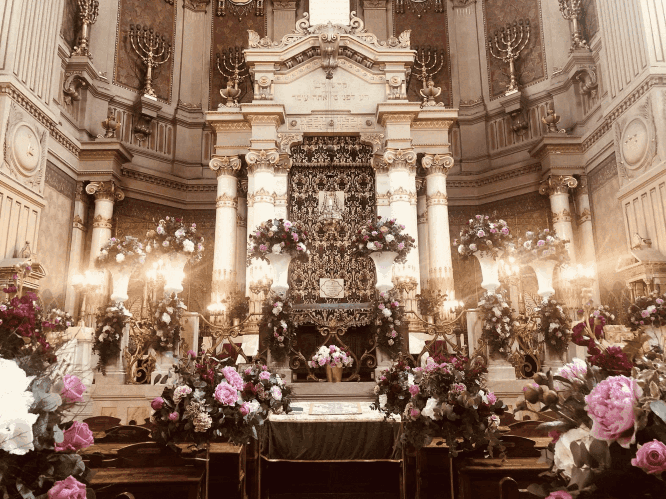 Ornate synagogue interior with floral decorations in Italy