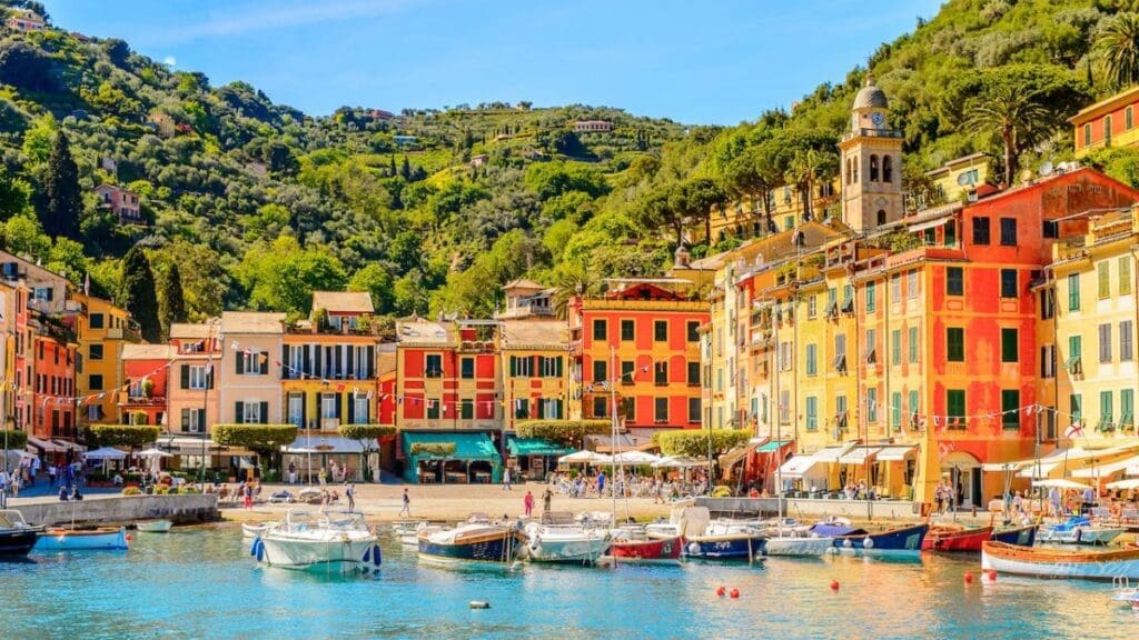 Colorful waterfront buildings in a scenic harbor, possible wedding location