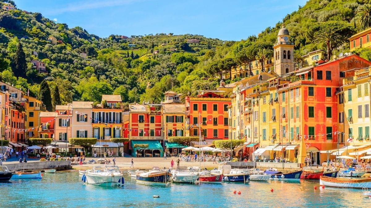 Colorful waterfront buildings in a scenic harbor, possible wedding location