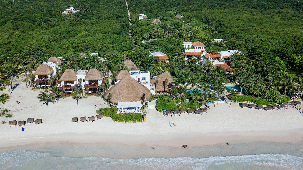 Aerial view of beachfront villas at Hotel Esencia, perfect for Mexico weddings and honeymoons