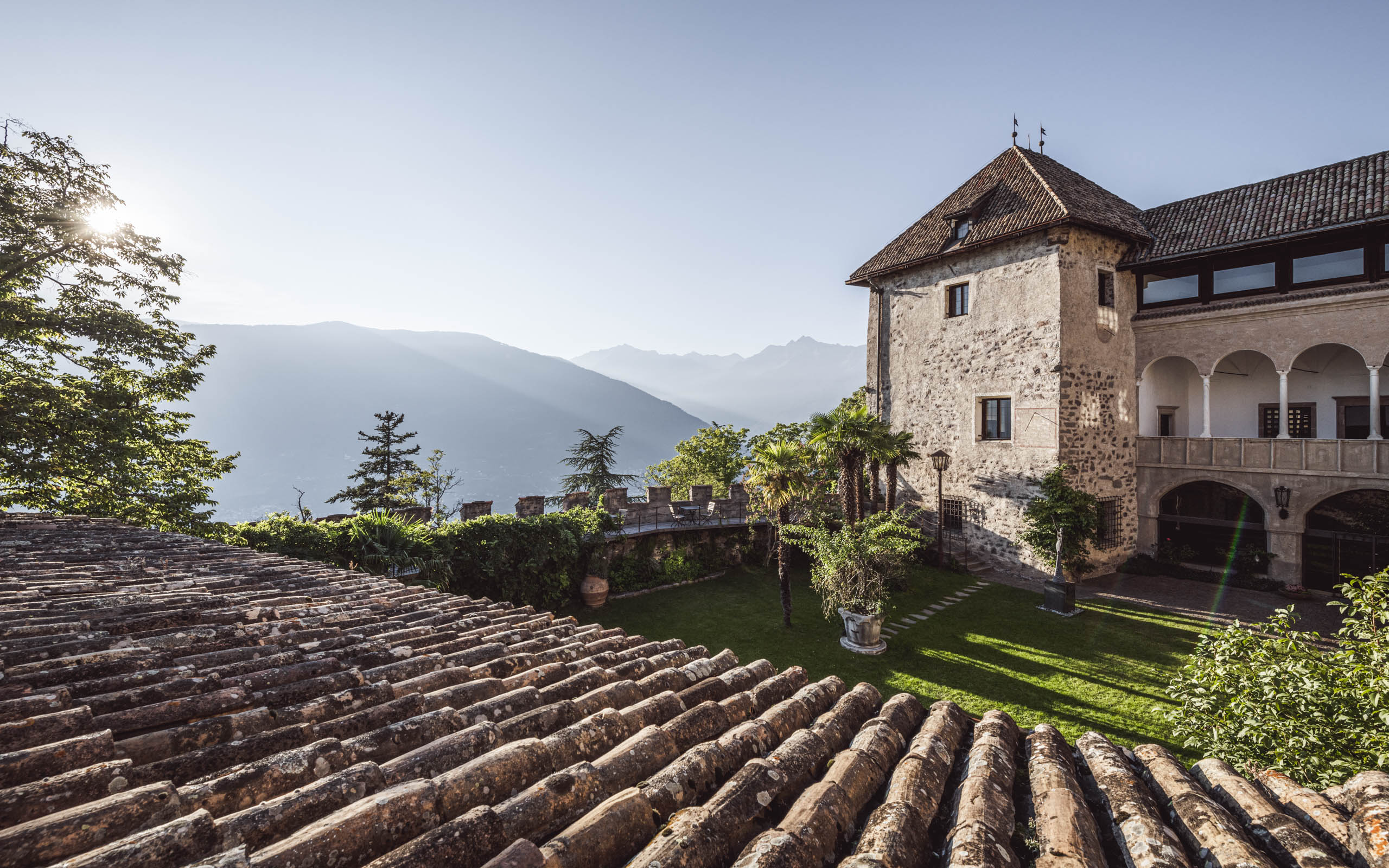 Italy castle with lush gardens and mountain view, ideal for a wedding at Castel Fragsburg Paternum