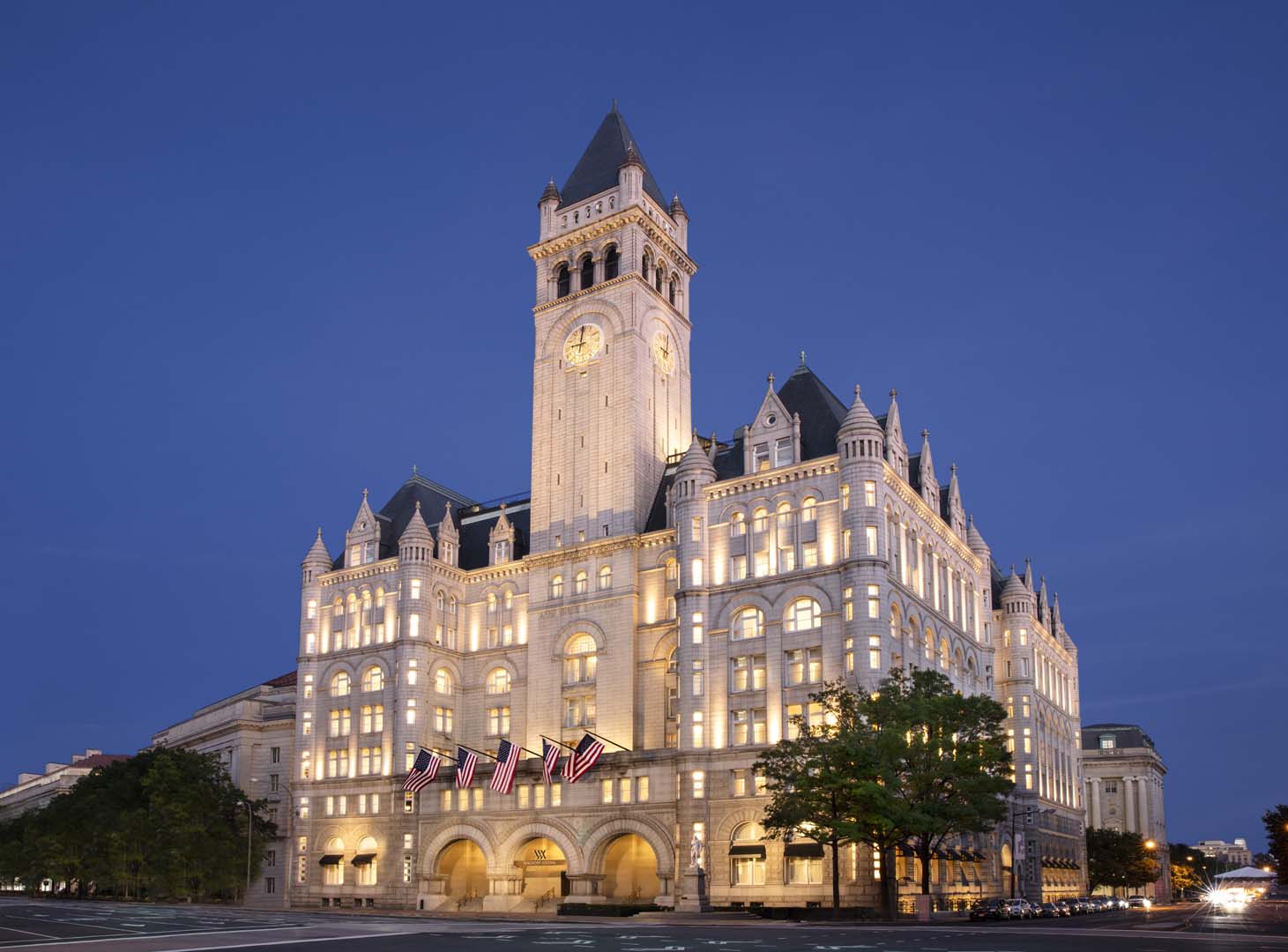 Waldorf Astoria Washington DC at dusk with illuminated facade