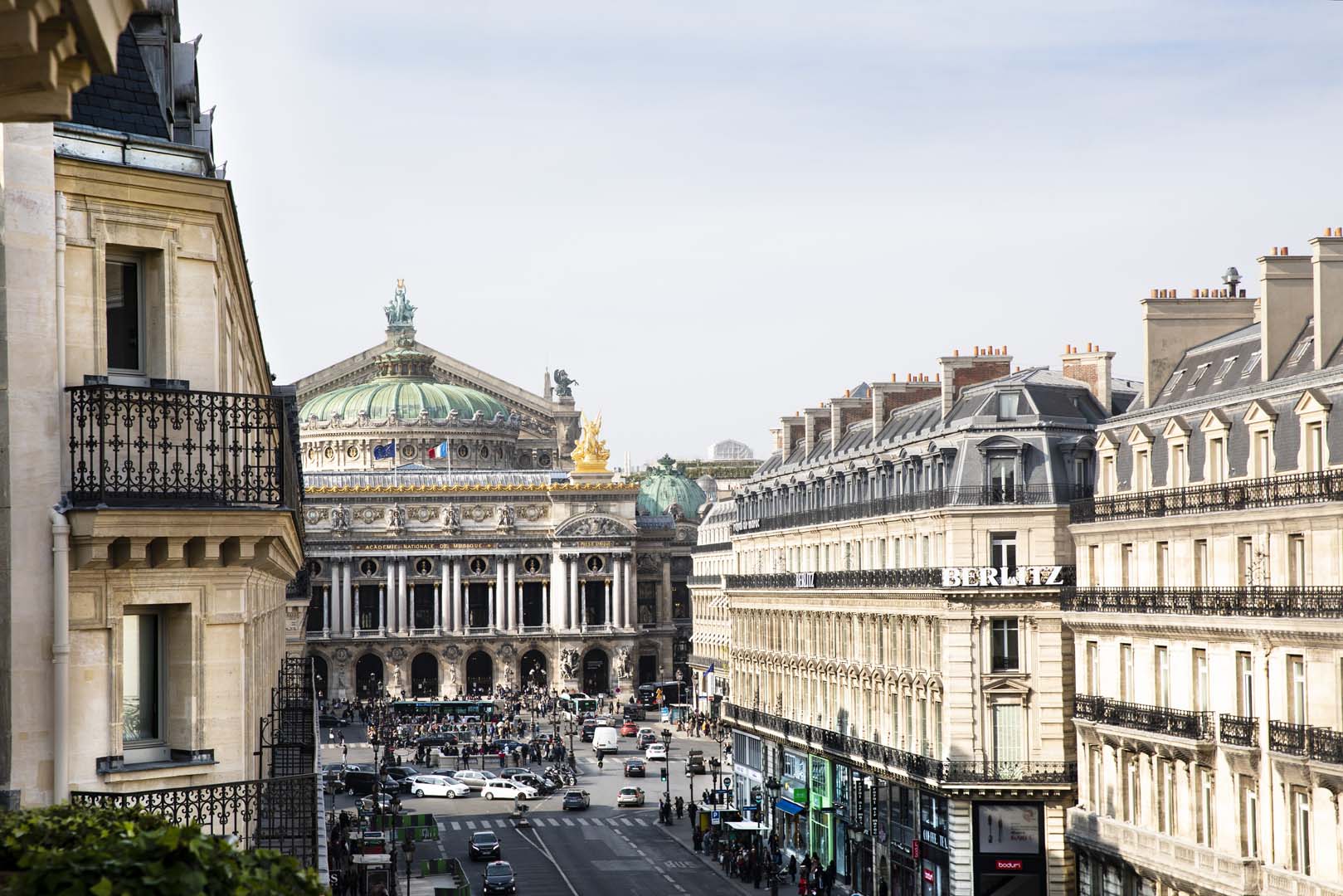 View of Paris street with historic buildings near Hotel Edouard 7