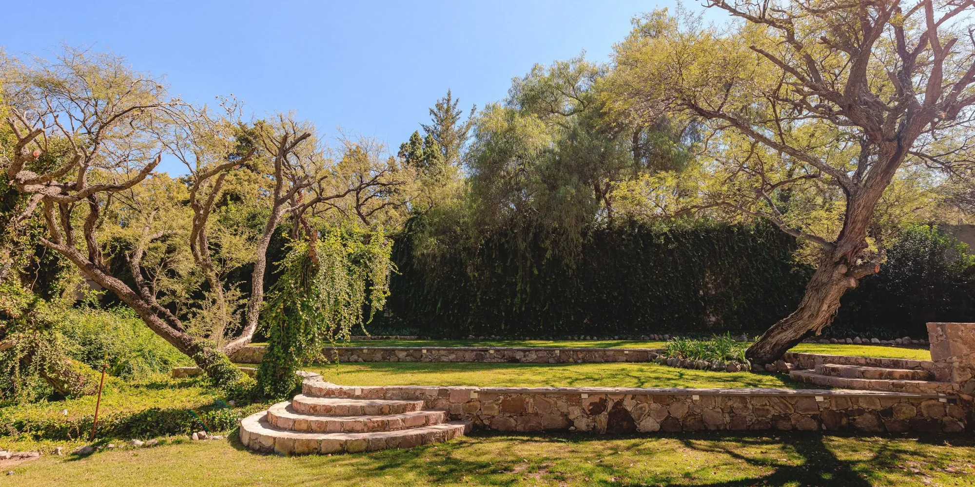 Stone steps and tiered garden at a luxurious Mexican wedding venue. Dream wedding in Mexico.
