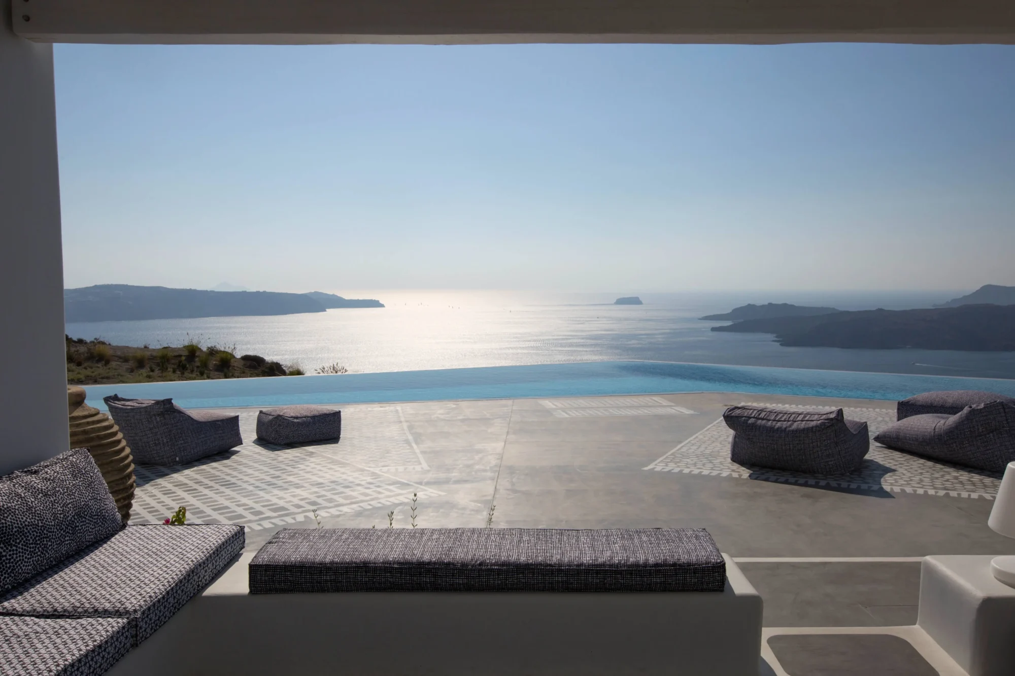 Infinity pool overlooking the Aegean Sea; dream Santorini wedding venue.