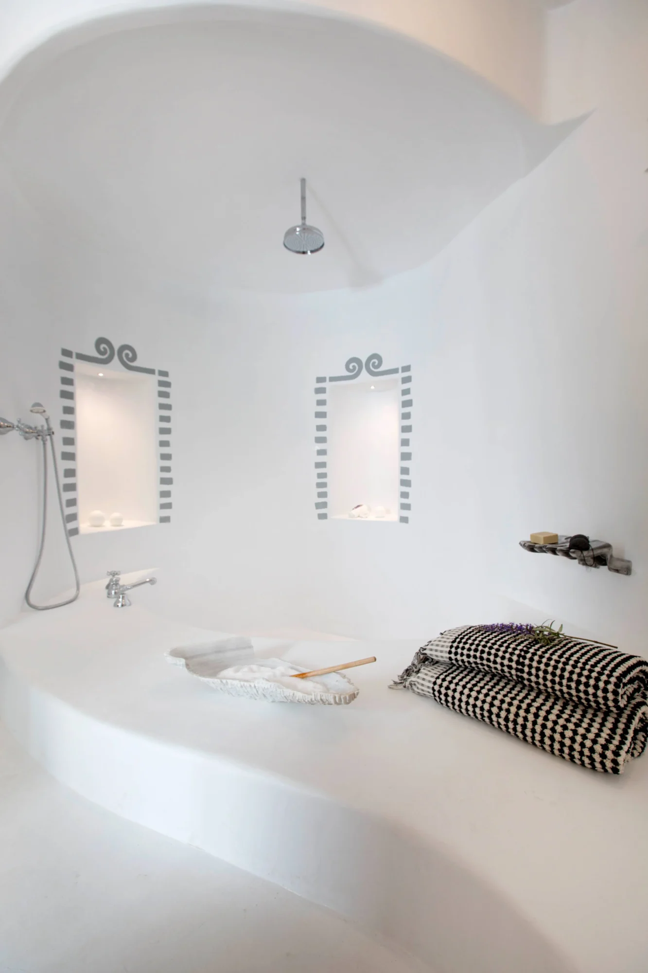 Luxury Santorini bathroom with shower and bath, perfect for a dream wedding.