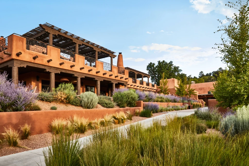 Exterior of Bishop's Lodge, Auberge Resorts Collection in New Mexico. Landscaped grounds ideal for a New Mexico wedding.