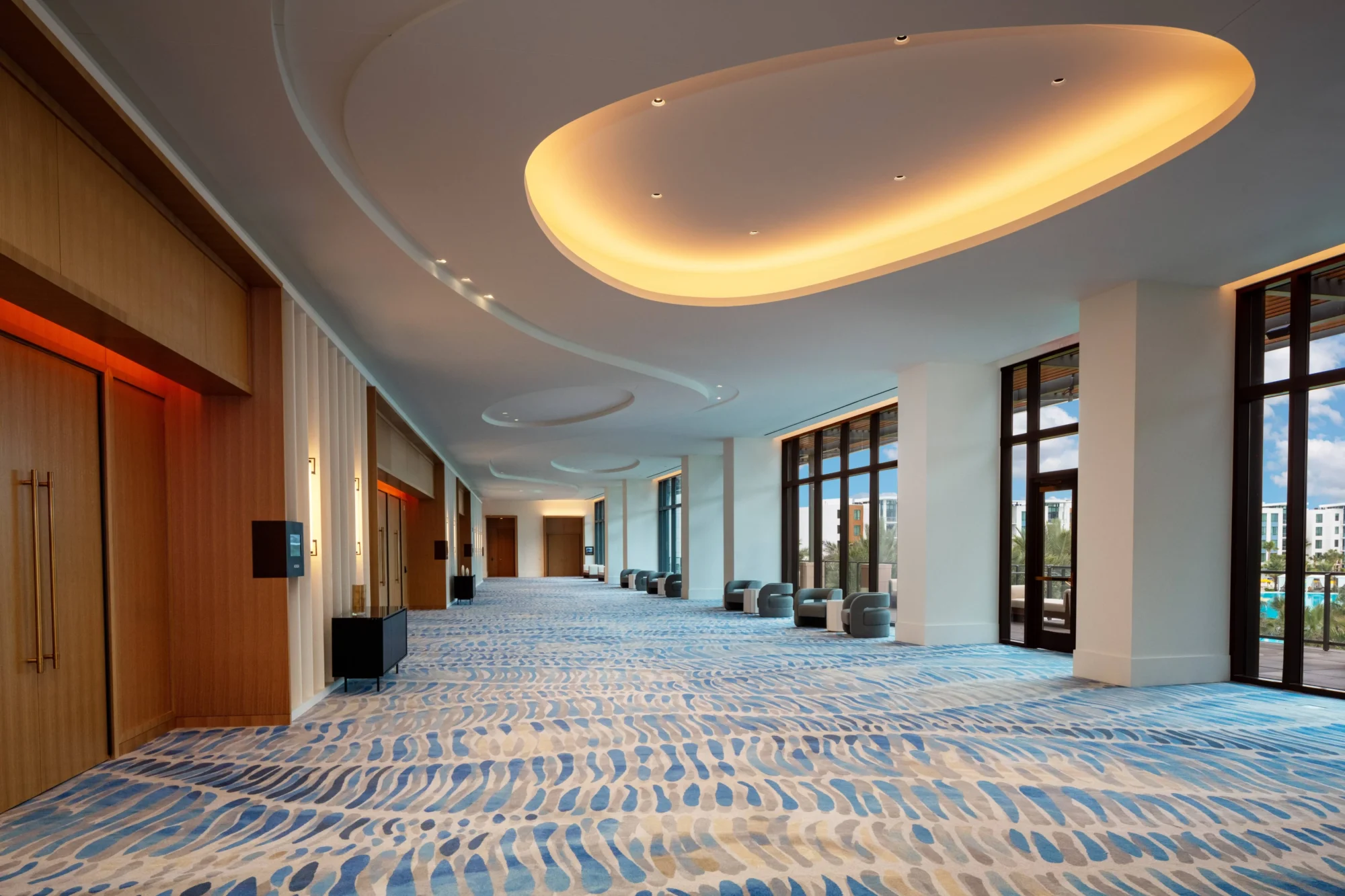 Hotel hallway with wave-patterned carpet, perfect for an Orlando wedding destination.