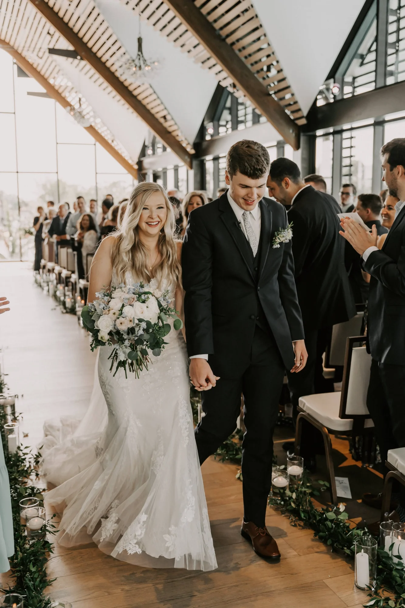 Newlyweds walking down the aisle at an Orlando wedding destination.