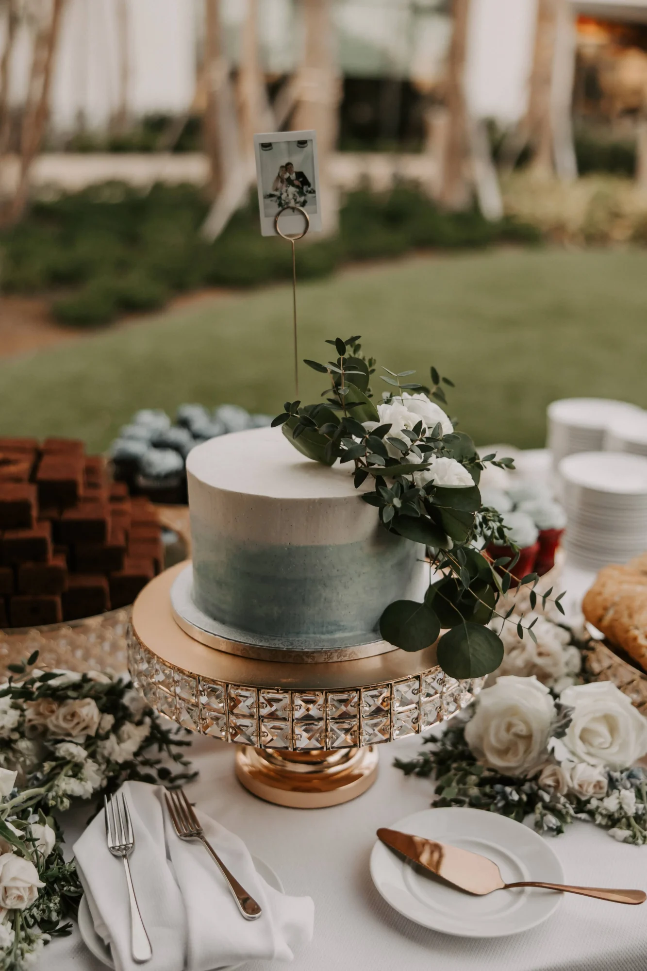 Elegant wedding cake with floral decorations at an Orlando wedding destination.