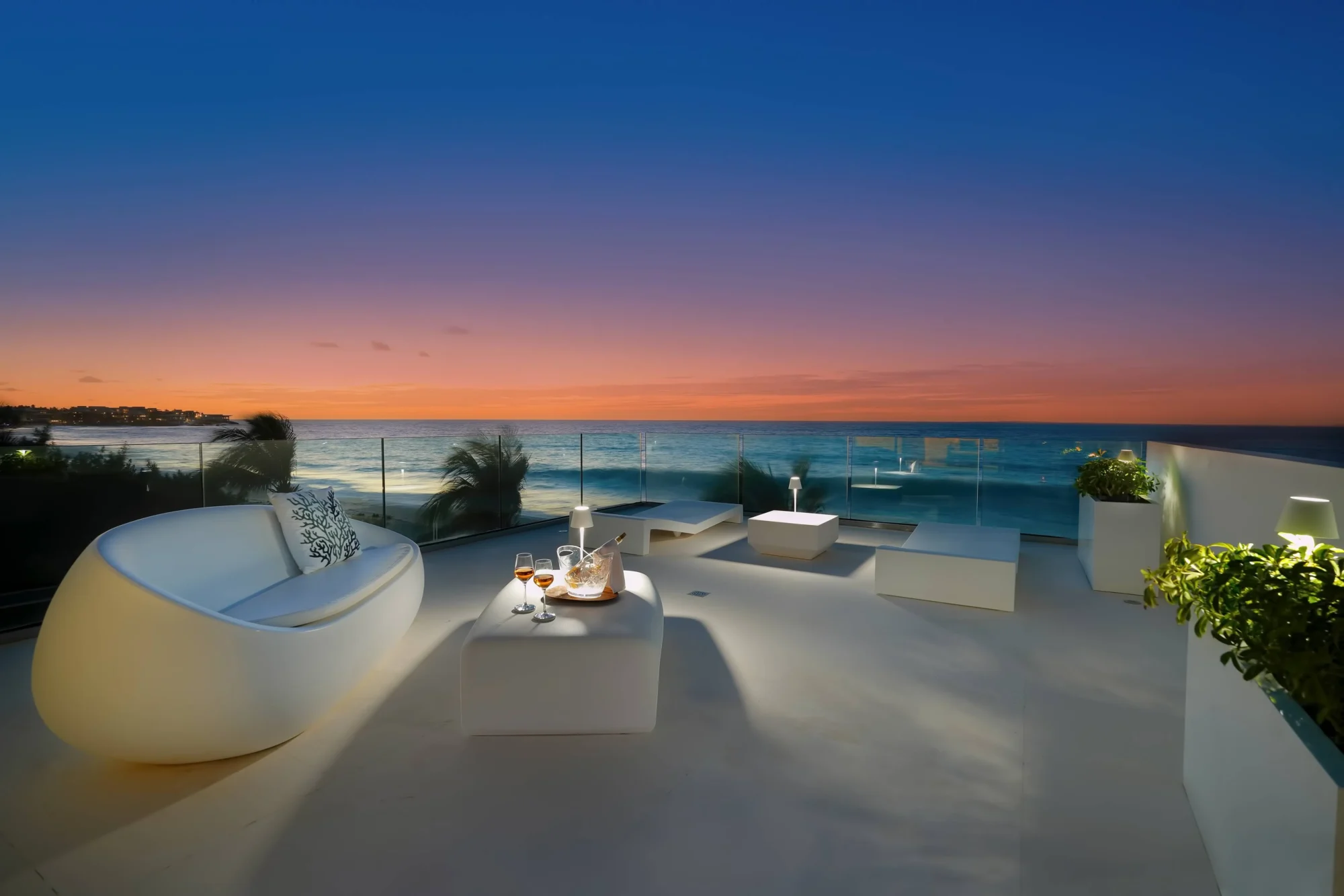 Luxury beachfront patio at sunset, perfect for an Anguilla destination wedding.