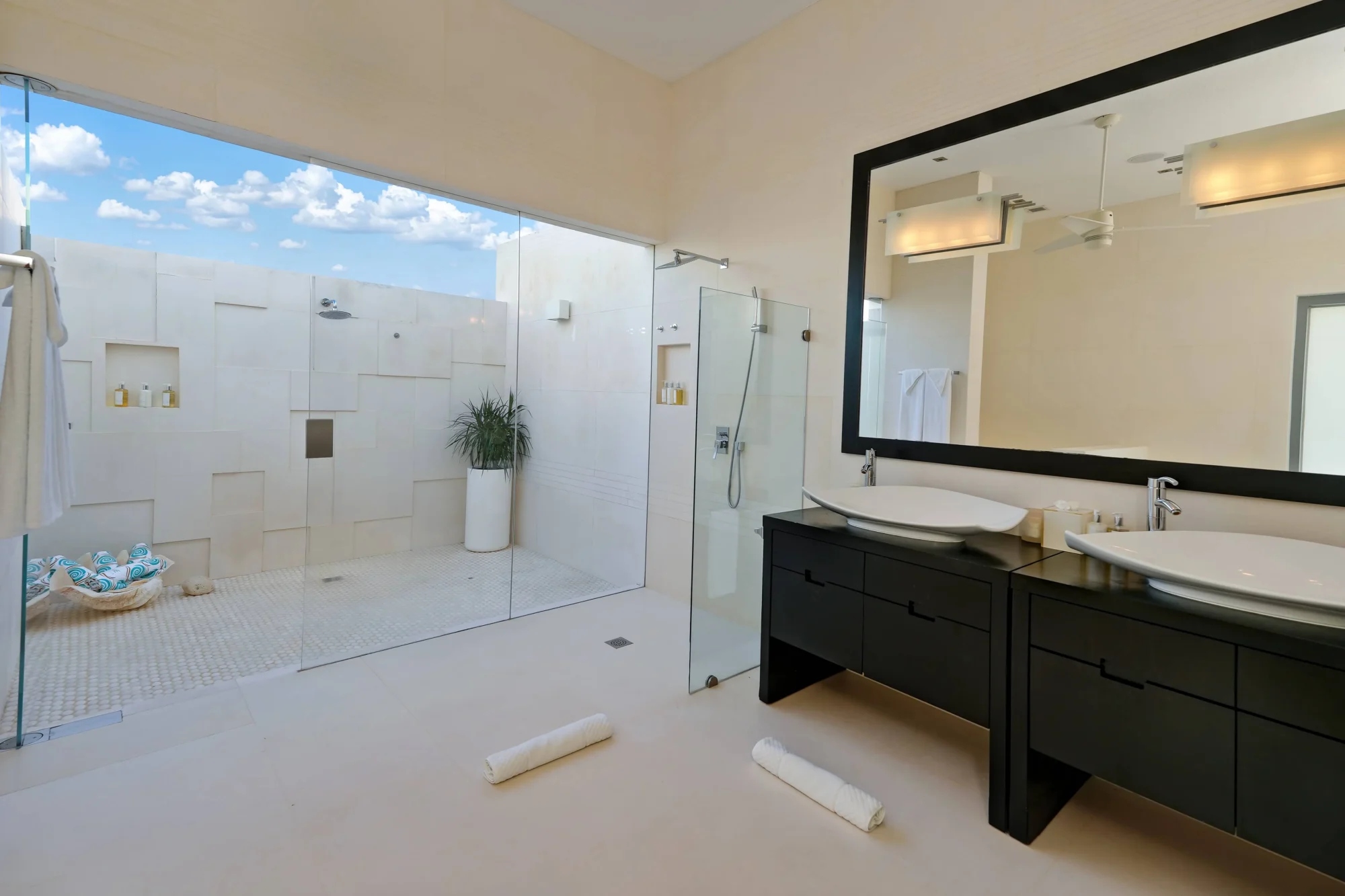 Luxurious bathroom with outdoor shower, perfect for an Anguilla destination wedding.