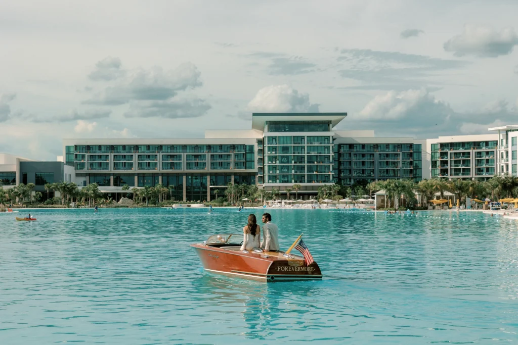 Couple on "Forevermore" boat at Conrad Orlando, a beautiful Orlando wedding destination.