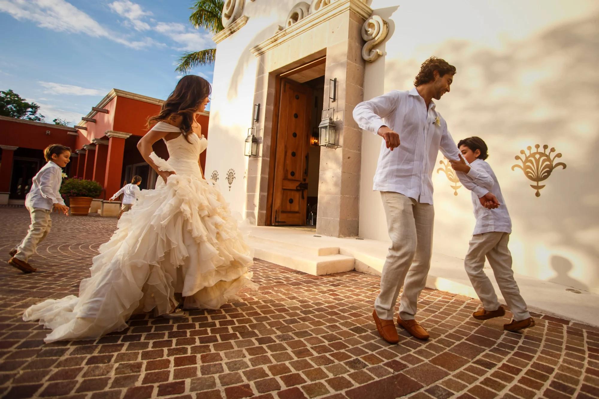 Bride and groom with children at a Riviera Maya Beach Wedding