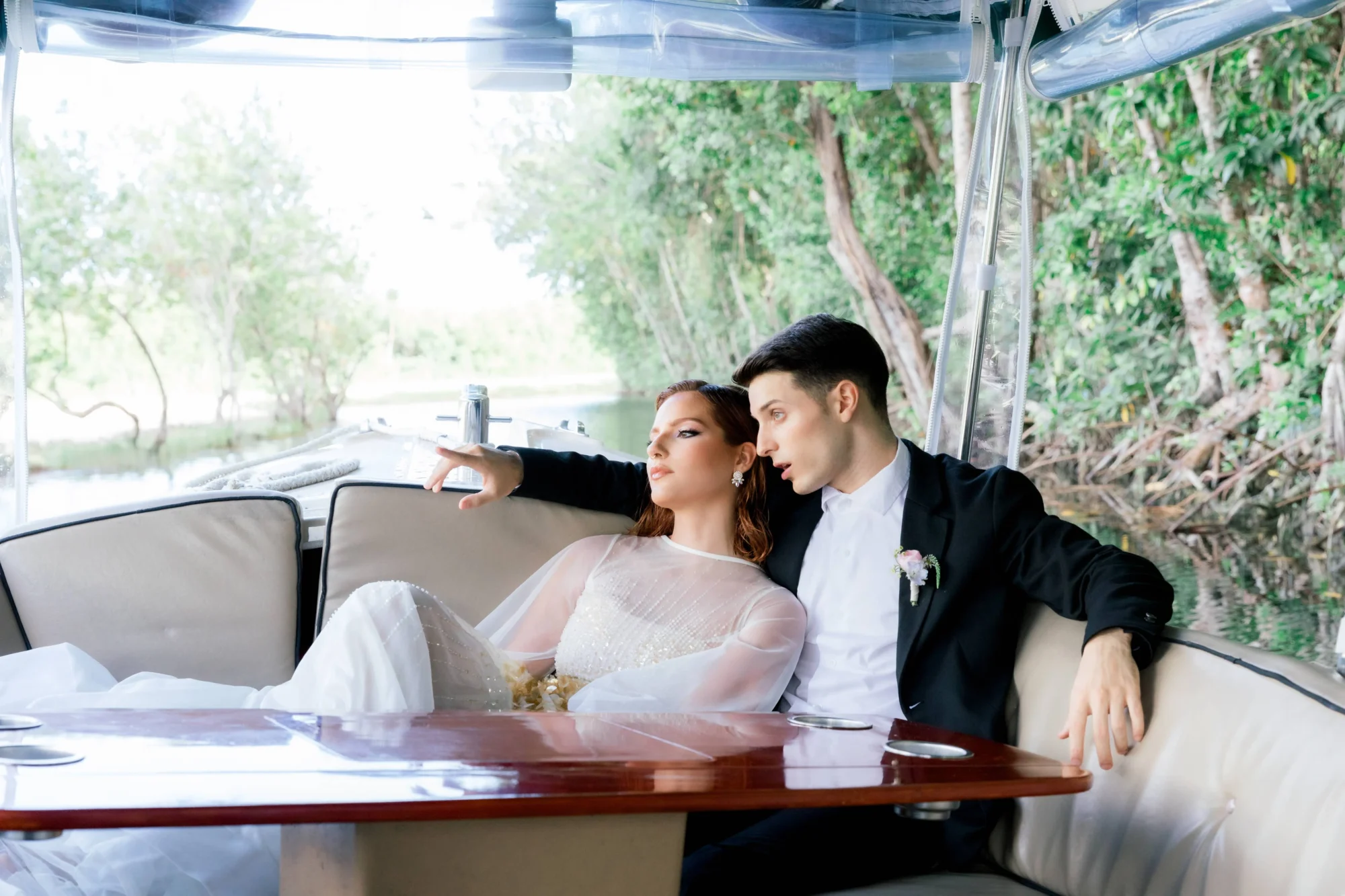 Newlyweds on a boat, Riviera Maya Beach Wedding at Fairmont Mayakoba
