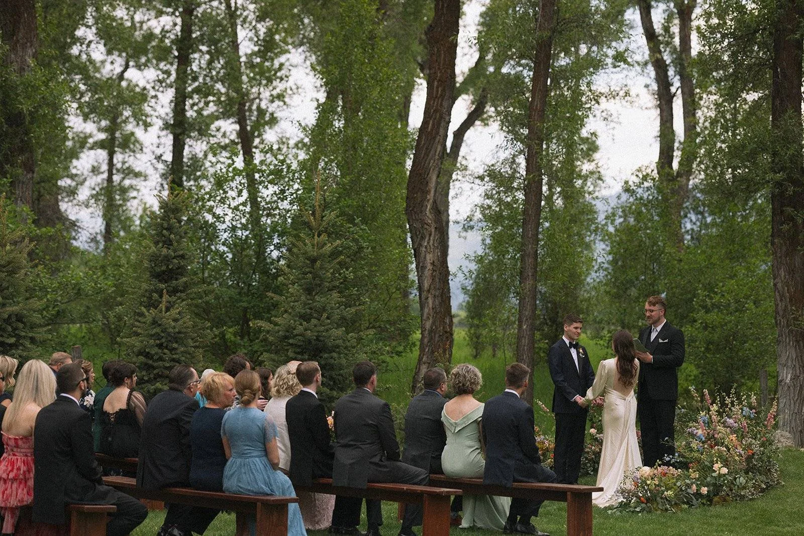 Jackson Hole Wyoming wedding ceremony in a forest setting