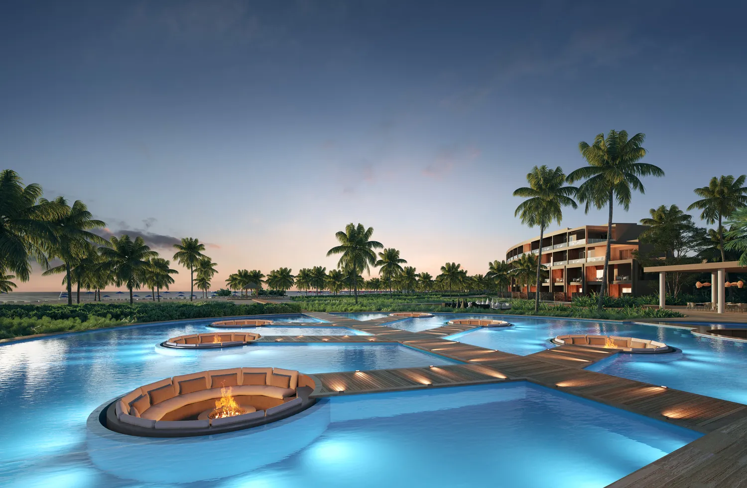 Luxury pool at Zemi Miches All-Inclusive Resort with fire pits and lounge seating.