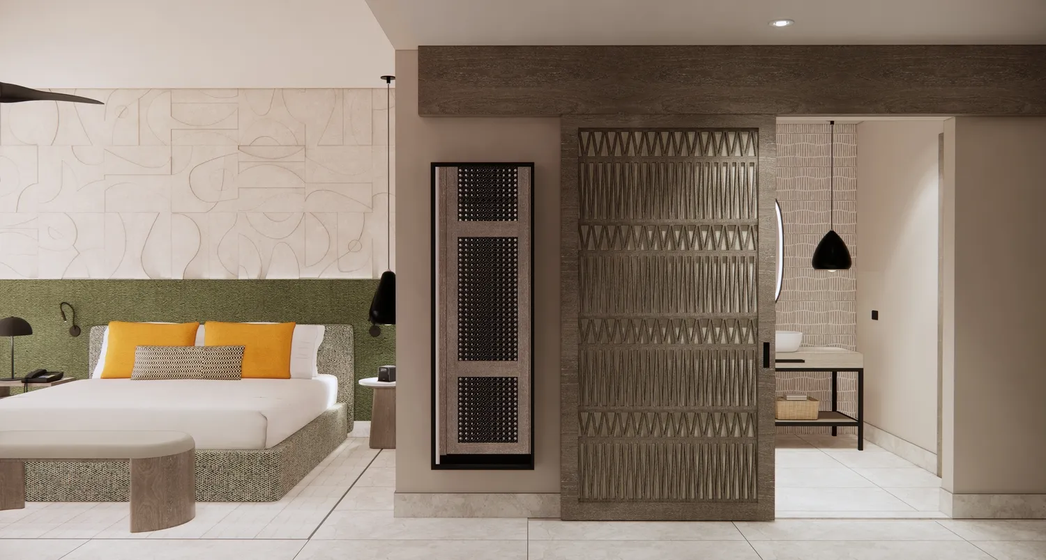 Modern bedroom suite at the Zemi Miches All-Inclusive Resort. Features a comfortable bed and a sliding door to the bathroom.